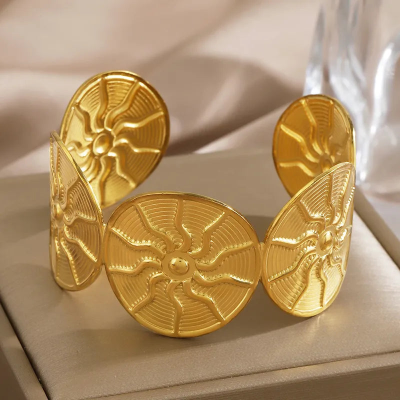 Gold Textured Sunburst Disc Cuff Bangle