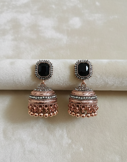 Majestic Royal Black Stone Antique Gold Jhumka Earrings