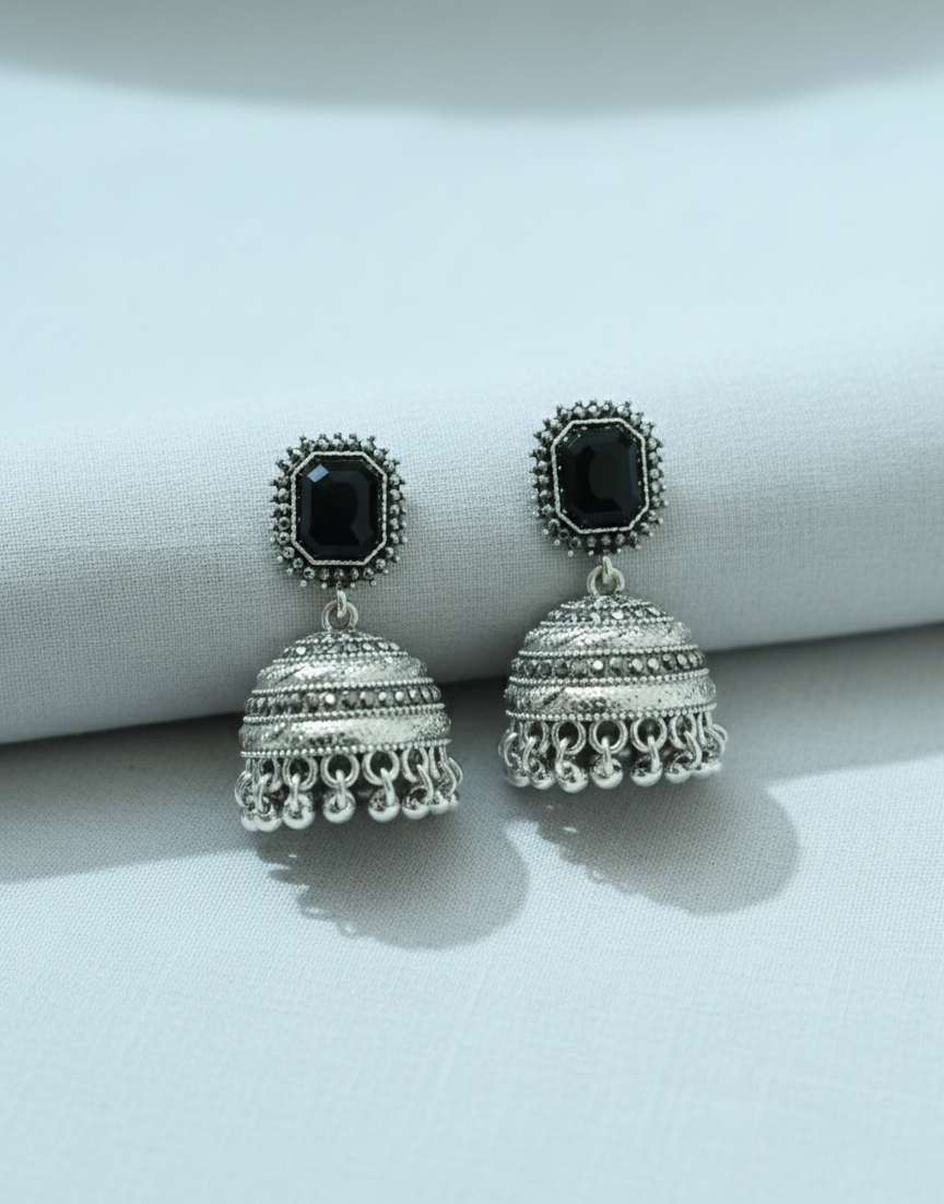 Majestic Royal Black Stone Antique Gold Jhumka Earrings