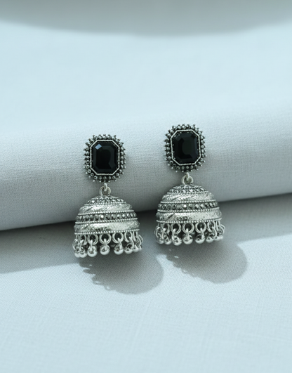 Majestic Royal Black Stone Antique Gold Jhumka Earrings