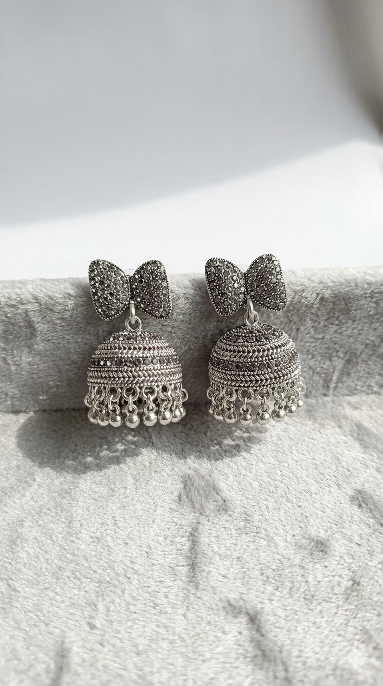 Premium Oxidised Silver Bow-Tie Jhumka Earrings – Heavy Stainless Steel Ethnic Statement Piece