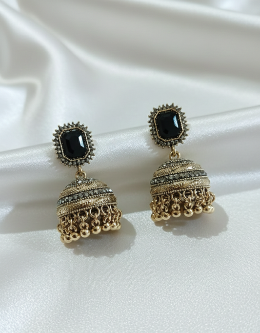 Majestic Royal Black Stone Antique Gold Jhumka Earrings