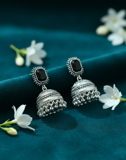 Majestic Royal Black Stone Antique Gold Jhumka Earrings