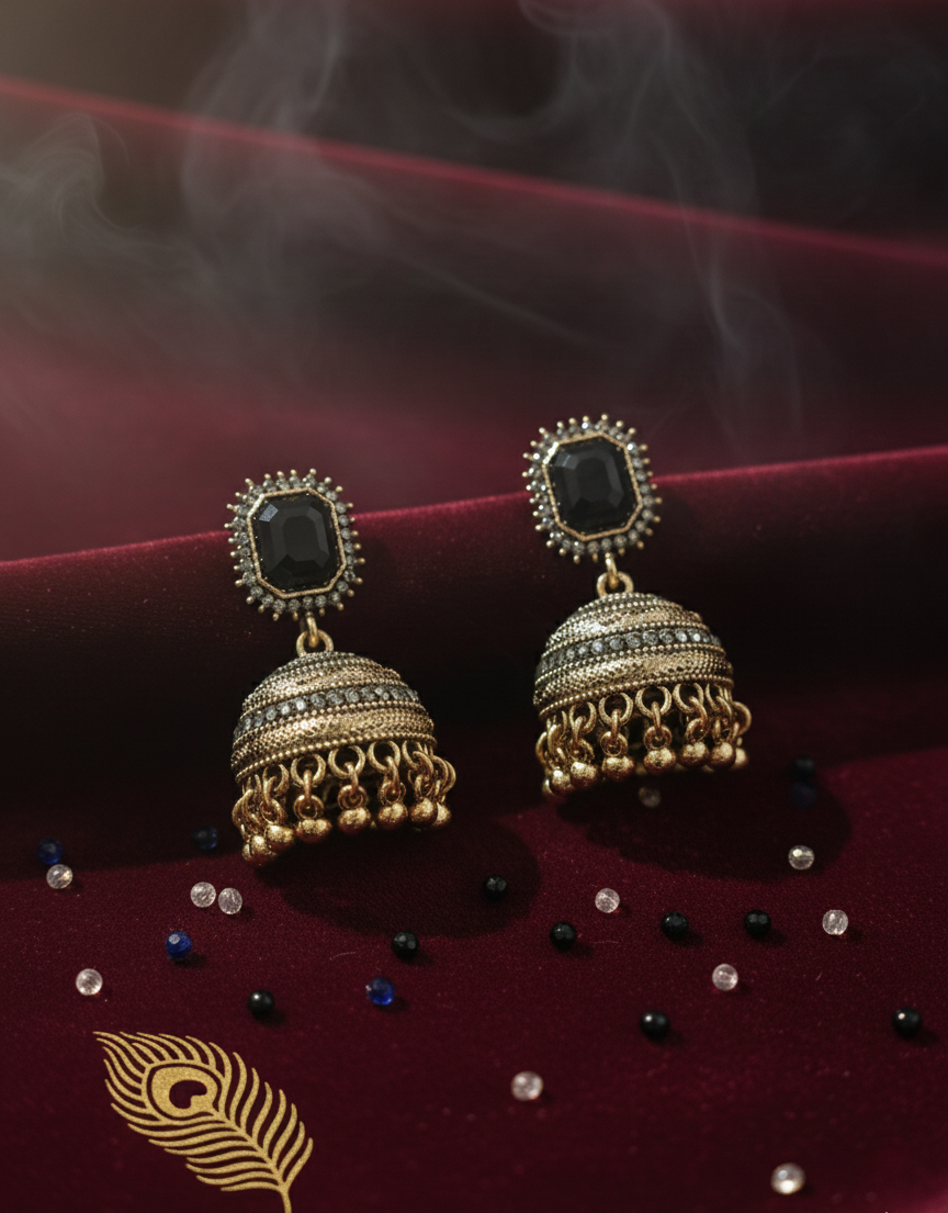 Majestic Royal Black Stone Antique Gold Jhumka Earrings