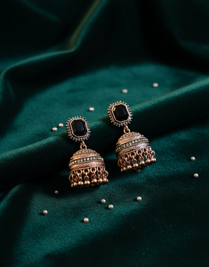 Majestic Royal Black Stone Antique Gold Jhumka Earrings
