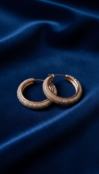 Elevate your style with the radiant glow of these Dazzling Rose Gold Mesh Pave Hoop Earrings.