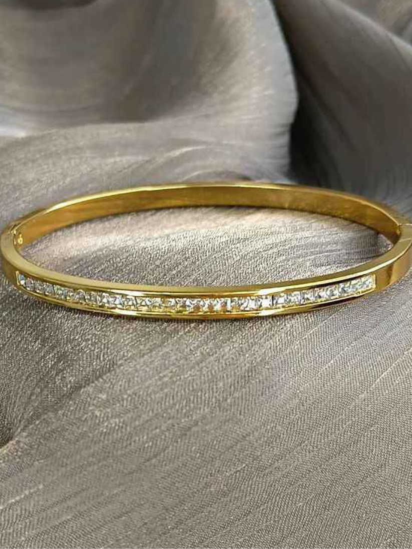 Classic Gold & Channel-Set Zirconia Oval Bangle