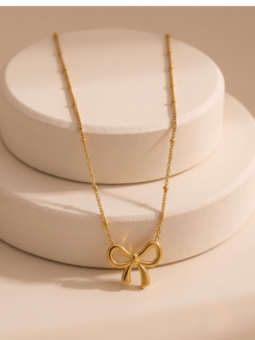 The Golden Ribbon Bow Pendant Necklace
