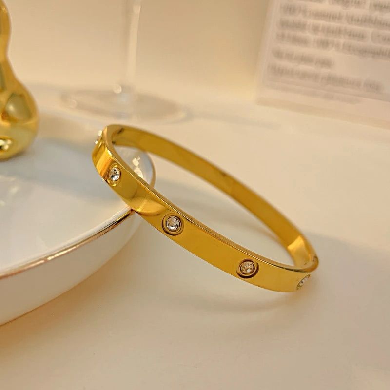 Crystal-Inlaid Gold Bangle Bracelet
